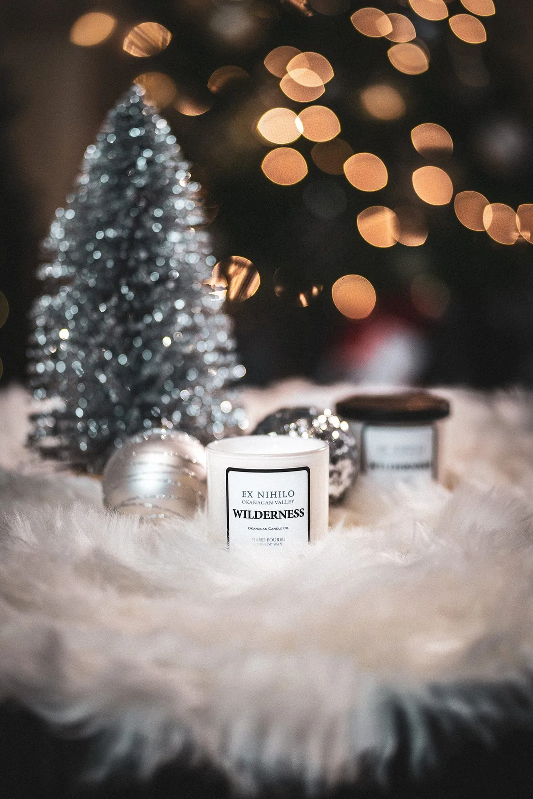 Candle in a festive holiday setting